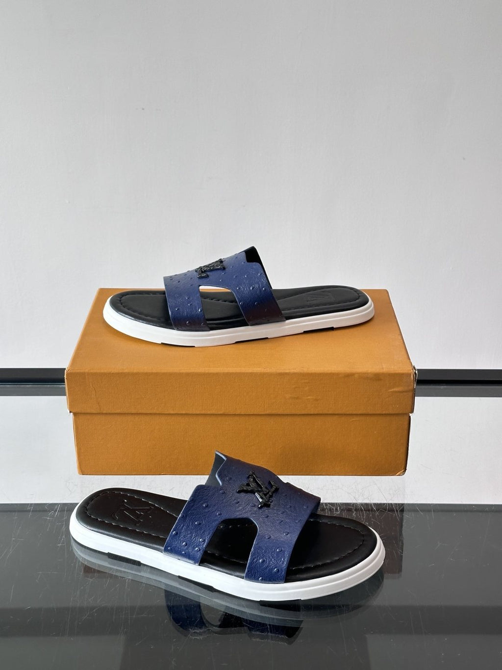 Louis Vuitton Embossed Blue Slide Sandals
